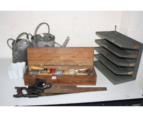 TWO GALVANISED WATERING CANS, together with a wooden tool box containing various hand tools and a metal file organiser (5)