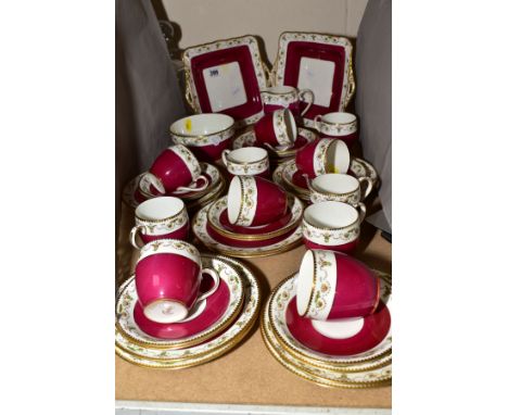 A FENTON CHINA TEA SERVICE IN 'MILO' PATTERN, comprising of a pair of square twin handled cake plates, eleven tea cups, twelv