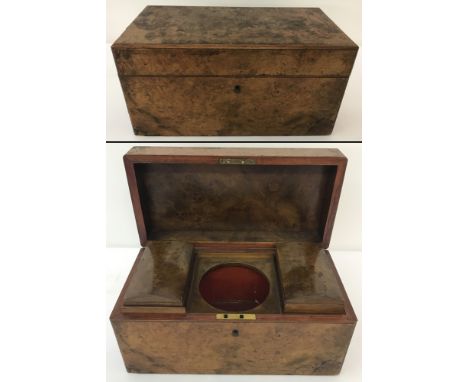 A burr walnut tea caddy with two lined containers and space for mixing bowl. One liner lid a/f. L30cm x D15cm x H15cm.