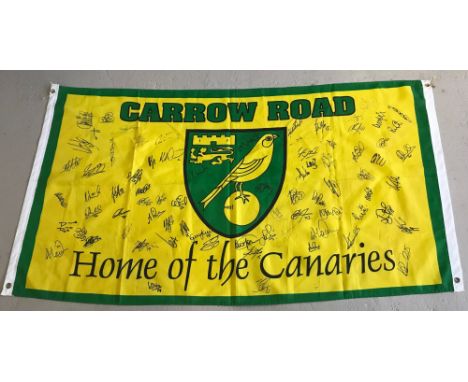 A Carrow Road "Home Of The Canaries" signed football flag with over 100 signatures. Vendor advises this flag was used as a ta