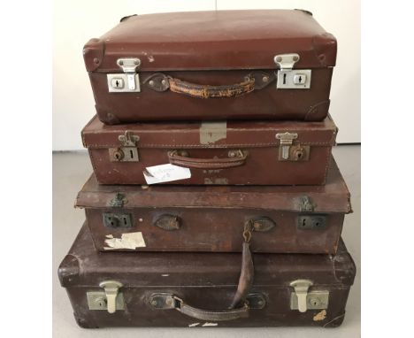 4 vintage brown suitcases of varying sizes, one leather. Largest approx. 38cm x 60cm.