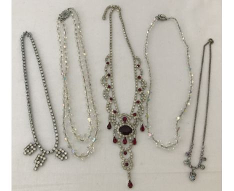 A small collection of vintage diamante and aurora borealis glass bead necklaces.