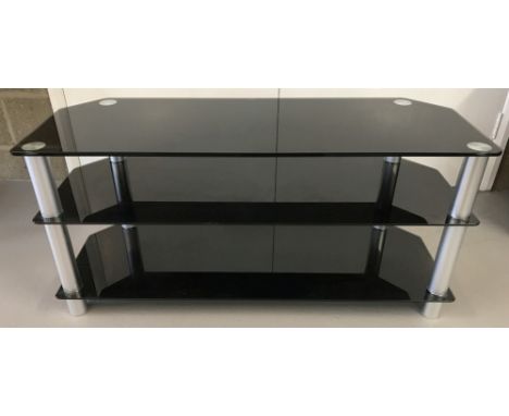 A black glass and chrome 3 shelf tv/entertainment unit.