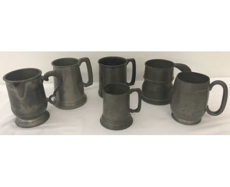 A collection of 6 pewter tankards. To include Victorian with spout and Edwardian with engine turned decoration.