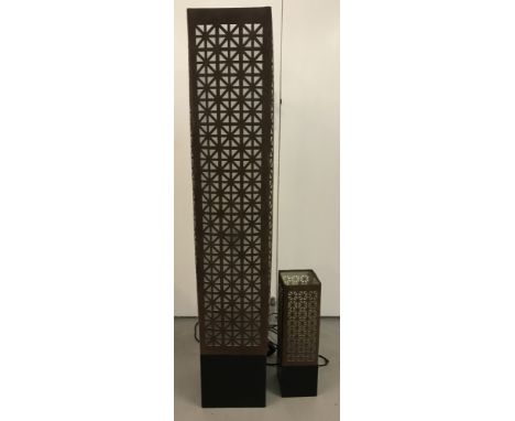 A suedette geometric pattern floor standing modern lamp  together with a matching table lamp.