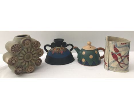 4 pieces of studio pottery. A Bernard Rooke Aztec design vase signed to one side, a vase with red fish design with indistinct