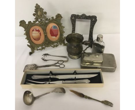 A collection of vintage metal ware items including brass and silver plate. To include: a decorative brass double photo frame,