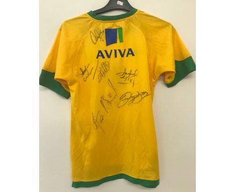 A 2008/9 Aviva Norwich City FC Xara home shirt signed by 17 players past and present. Signatures include: Darren Huckerby, Ko