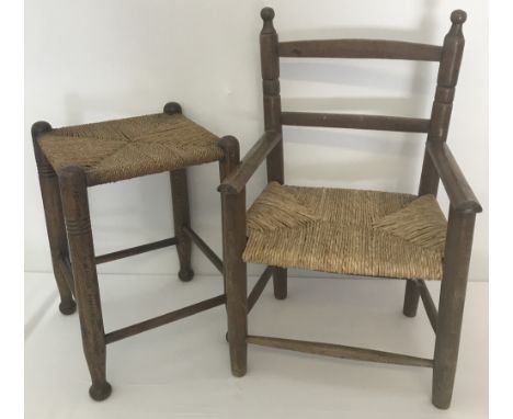 A child's vintage rush seated arm chair together with a vintage string topped stool.