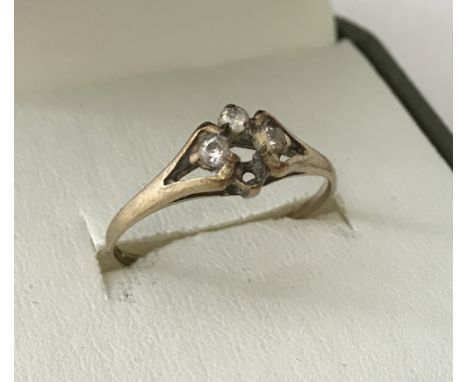 A 9ct gold clear stone set ladies dress ring. Central stone missing along with one small clear stone. Total weight approx. 1.