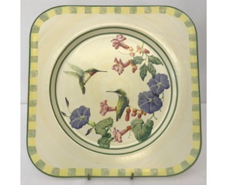 A large square shaped Lenox ceramic charger depicting ruby throated hummingbirds. "Summer Greetings" by Catherine McClung. Ap