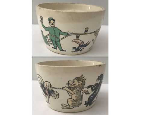 A vintage Guinness pudding bowl (lid missing) depicting a zoo keeper and his animals.By T.G. Green &amp; Co. Ltd, Church Gres