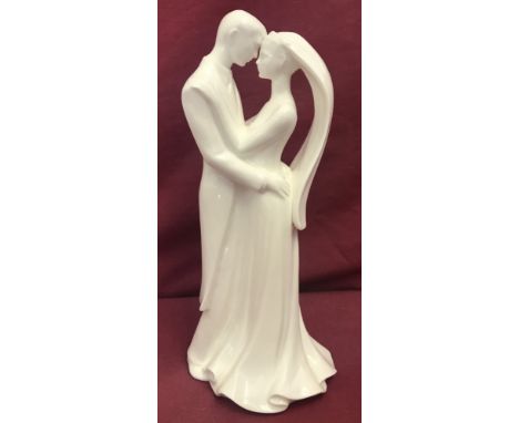 A Wedgwood white ceramic  "To Have &amp; To Hold"  bride and groom figurine.  #CW445.