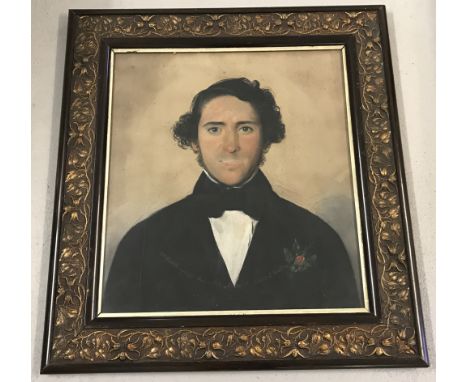 An original pastel portrait in a decorative frame of a young man of the Victorian era.Inscription on piece reads "Wm. Brettel