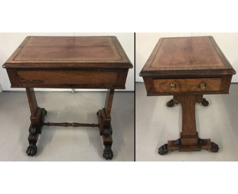 A vintage dark wood writing desk with leather insert to top. Claw feet raised on brass castors, decorative detail to legs and