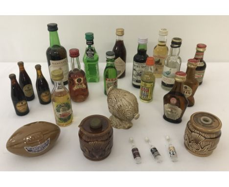 A collection of vintage glass and ceramic miniatures. To include Beswick ceramic Haggis Beneagles whisky decanter, Copeland S