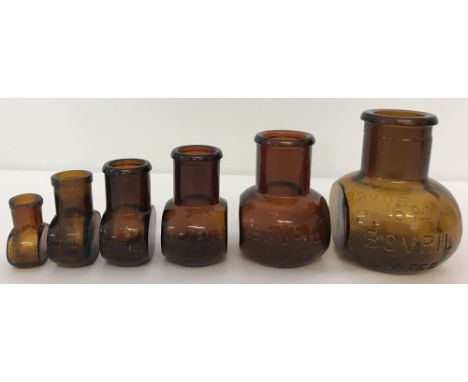 A set of 6 vintage brown glass Bovril jars in an assortment of sizes. 16oz bottle down to ½oz bottle.