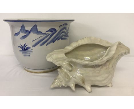 2 vintage ceramic planters. A large blue and white Chinese planter decorated with oriental scenery. Together with a lustre co