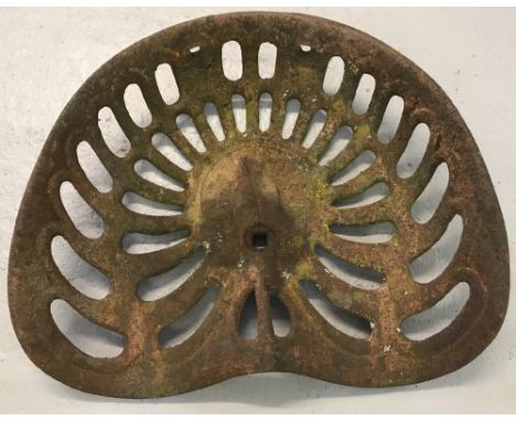 A vintage cast iron tractor seat marked "Bamford". Approx. 43cm x 36cm.