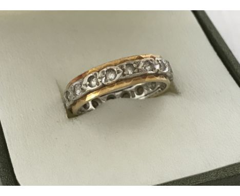  A  ladies 18ct gold diamond set eternity ring. Size N. Total weight approx. 4.85g.