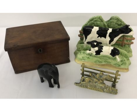 Two vintage letter racks, a small wooden box and carved wooden elephant.Large ceramic letter rack is from the James Herriot k