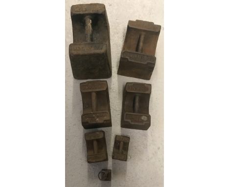 Seven vintage square weights. Ranging from 1/4lb to 28lb.