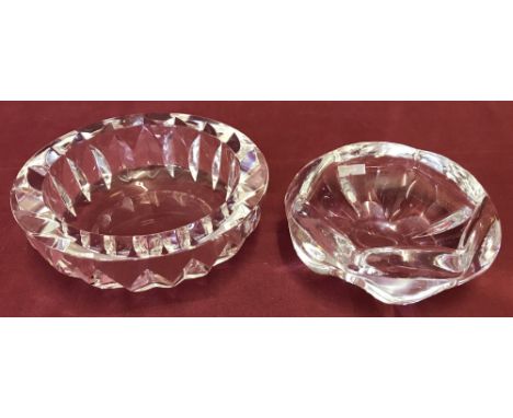 Two vintage Orrefors heavy glass dishes, both marked on base.One with lens cut decoration, the other with more fluid lines.La