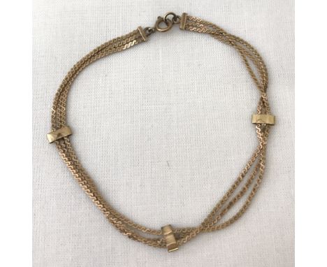 A 9ct gold vintage ladies 3 strand bracelet. Total length approx. 7 inches. Weight approx. 2.7g.