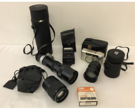 A collection of cased camera equipment. Comprising: Nikon One Touch Zoom 90 s AF camera with case,  a cased Pentax flash, A P