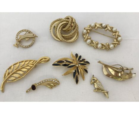 8 vintage gold tone brooches to include 1960's Grosse of Germany knotted brooch &amp; stone set examples