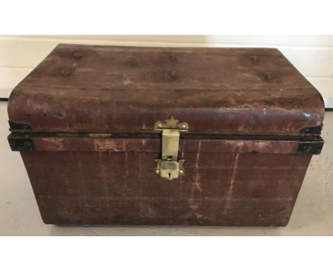 A vintage G.W.Vaughan &amp; sons steel trunk with brass catches and complete with key and padlock. Approx. 39cm x 62cm.