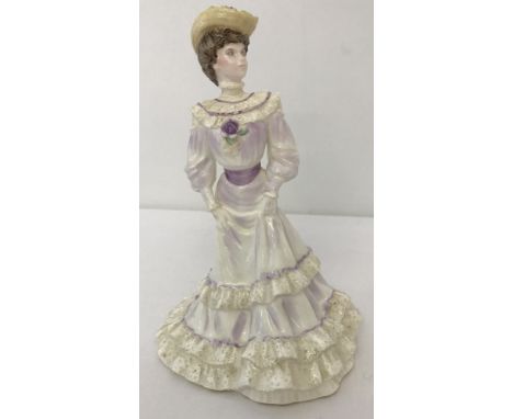 A ceramic numbered Limited Edition Coalport figurine from "The Golden Age" collection. Titled "Louisa at Ascot", designed by 