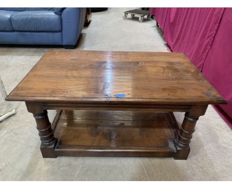 A joined low table, the moulded top on ring turned supports united by an understage. 36' long