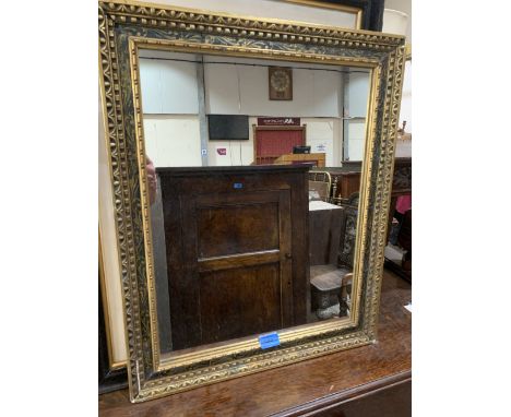 A giltwood mirror. 24' high
