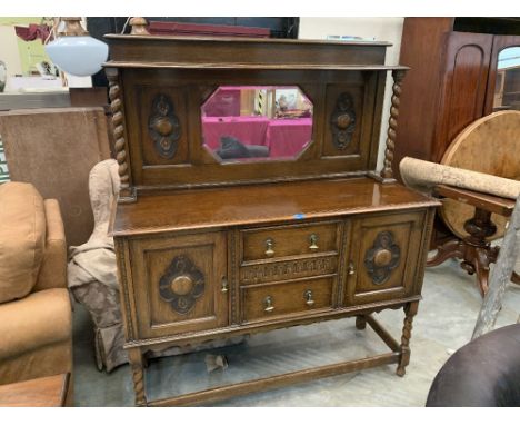A 1930s oak mirror back sideboard. 54' wide