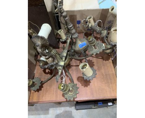 A pair of five light electroliers and a pair of wall lights