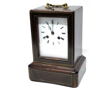 Late Victorian mantel clock in mahogany case with Roman numeral dial, 22cm high