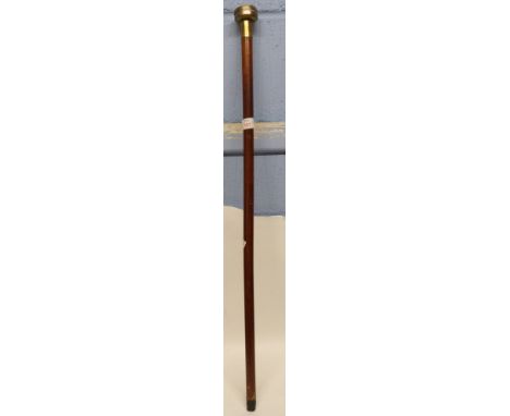 Walking cane, the top with brass mount and clock dial, 85cm long