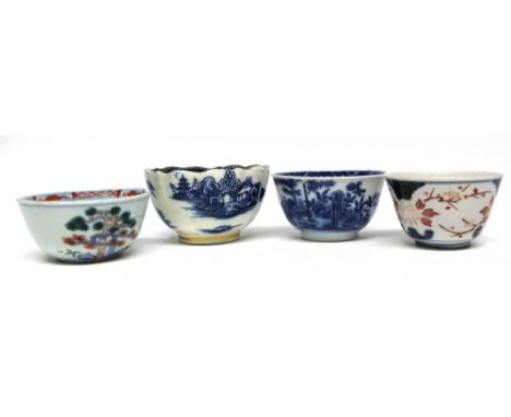 Group of Chinese 18th century tea bowls with various blue and white designs, together with a Caughley tea bowl of fluted shap