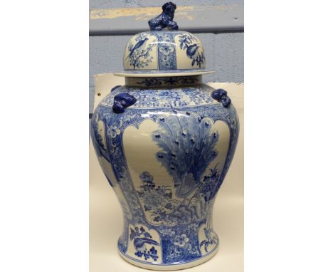 Large Chinese porcelain jar and cover modelled with panels of flowers and alternating panels of birds, the cover with similar