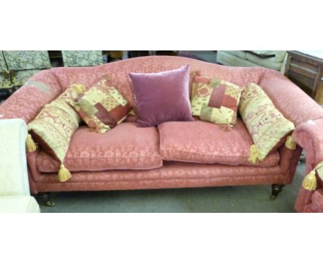 Mark Elliot contemporary pink/burgundy fabric covered three-seater sofa with serpentine back, complete with two fitted cushio