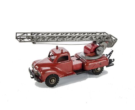 A Gama US Zone clockwork Fire Engine,  with hand operated extending ladder, G-VG clockwork tested well at time of cataloguing
