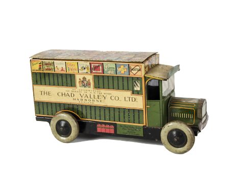 A Chad Valley Tinplate Clockwork Games Delivery Van, pre-war toy with green body, cream cab roof and multi-coloured van roof 