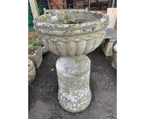 Reconstituted stone urn planter on large base