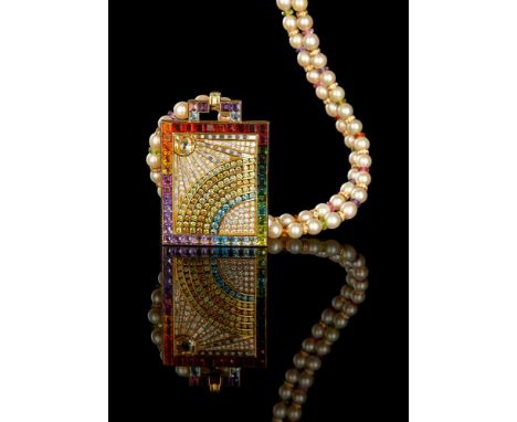 A multi gem set pendant and necklace by Adler, the rectangular panel designed as a shining sun and rainbow, set with a fancy 