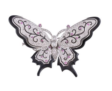 A diamond, pink sapphire and black enamel butterfly clip brooch, pavé set with brilliant cut diamonds, the wings overlaid wit