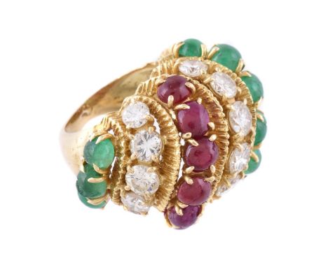 A 1970s diamond, ruby and emerald bombé dress ring, claw set with scrolled lines of graduated brilliant cut diamonds, approxi