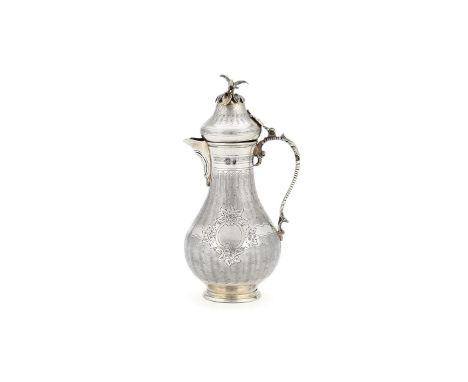 An Ottoman silver baluster coffee pot, Tughra and sah marks, probably Egyptian, early 20th century, with a bird and foliate f