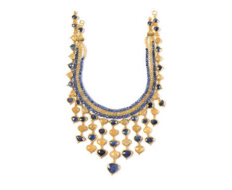 A sapphire and yellow sapphire parure by Natalia Josca, the bib fringe necklace set throughout with graduated heart shaped fa