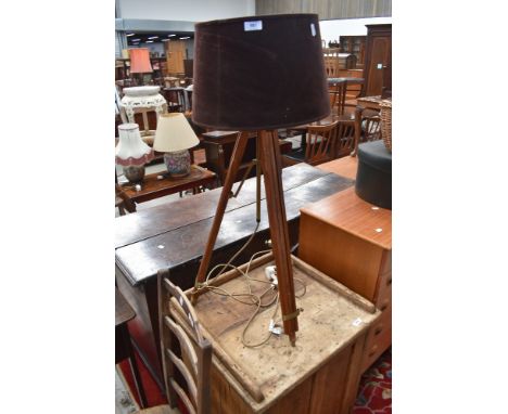 A vintage style standard lamp, having extendable frame, in the theodolite stand style, with velvetine shade